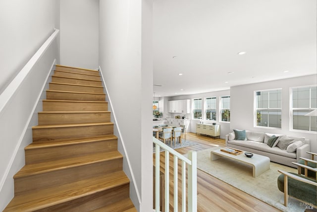 1480 Waterside Ln, Rohnert Park, CA 94928 - staircase featuring wood finished floors and recessed lighting