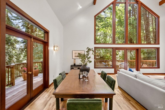 192 Carson Rd, Woodacre, CA 94973 - dining area featuring french doors, high vaulted ceiling, light wood-style floors, and healthy amount of natural light