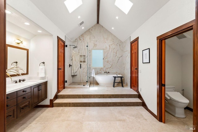 192 Carson Rd, Woodacre, CA 94973 - full bathroom featuring a skylight, lofted ceiling, a stall shower, a freestanding tub, and vanity