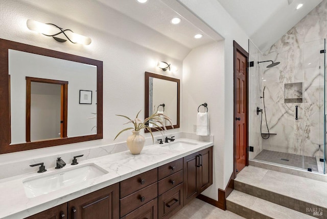 192 Carson Rd, Woodacre, CA 94973 - bathroom featuring vaulted ceiling, a marble finish shower, recessed lighting, and double vanity