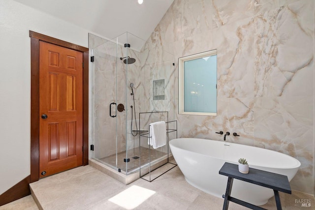 192 Carson Rd, Woodacre, CA 94973 - full bath featuring a stall shower, a freestanding tub, and tile walls
