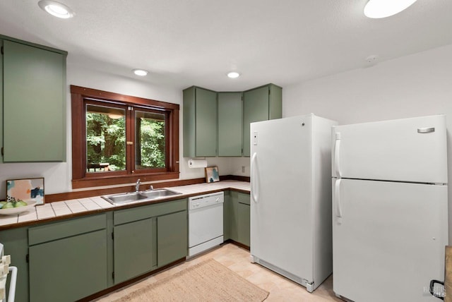 192 Carson Rd, Woodacre, CA 94973 - kitchen featuring white appliances, green cabinets, a sink, tile countertops, and recessed lighting