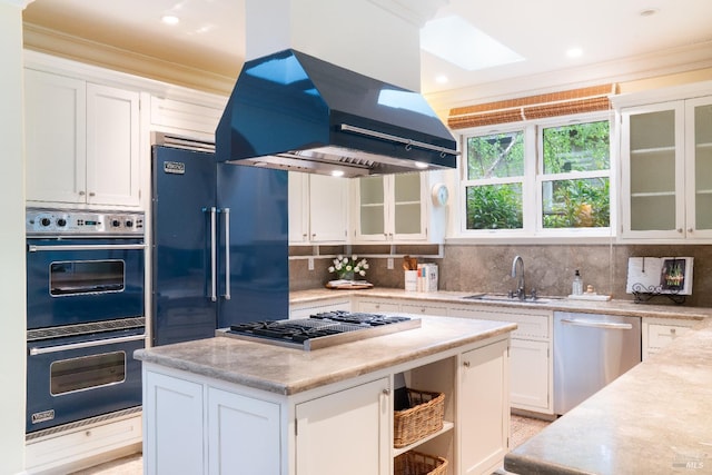 1330 Pine St, Saint Helena, CA 94574 - kitchen featuring appliances with stainless steel finishes, a sink, island range hood, crown molding, and white cabinets