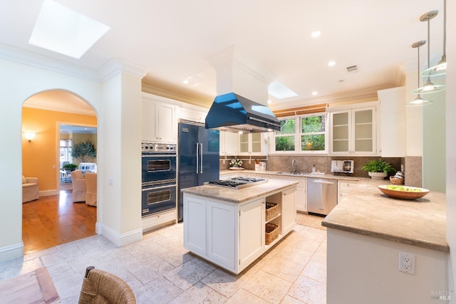 1330 Pine St, Saint Helena, CA 94574 - kitchen featuring stainless steel appliances, ornamental molding, arched walkways, white cabinetry, and backsplash