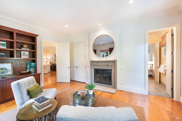 1330 Pine St, Saint Helena, CA 94574 - living room with crown molding, a glass covered fireplace, light wood-style flooring, recessed lighting, and baseboards