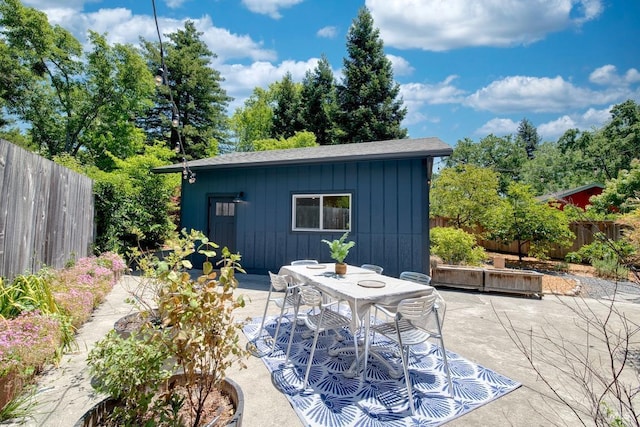 3051 Edison St, Graton, CA 95444 - fenced backyard with a patio area, an outbuilding, and outdoor dining area