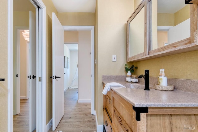 3051 Edison St, Graton, CA 95444 - bathroom featuring wood finished floors, vanity, and baseboards