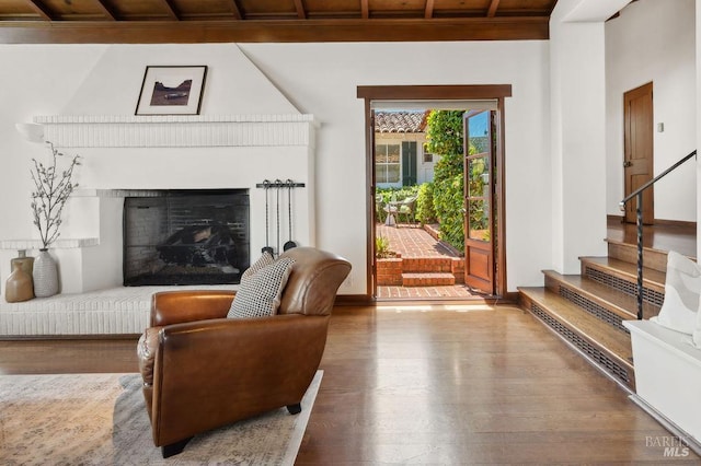 4 Cloud View Cir, Sausalito, CA 94965 - living area featuring wood finished floors, a fireplace, stairway, and baseboards