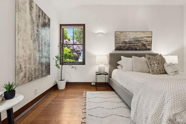 4 Cloud View Cir, Sausalito, CA 94965 - bedroom with wood finished floors, vaulted ceiling, and baseboards