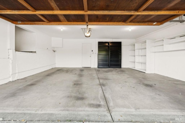 4 Cloud View Cir, Sausalito, CA 94965 - garage with wooden ceiling and a garage door opener