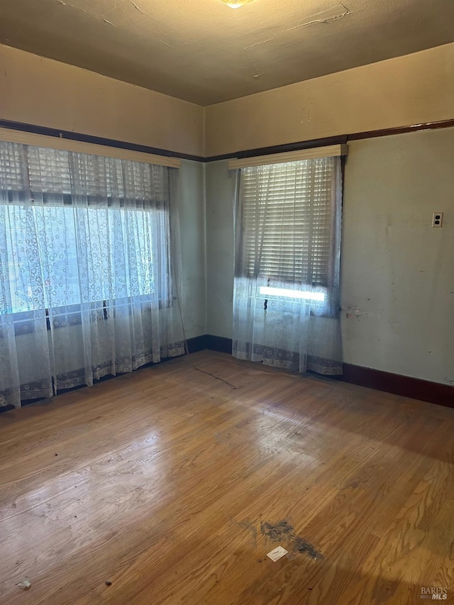 718 Monterey St, Vallejo, CA 94590 - spare room featuring wood finished floors and baseboards