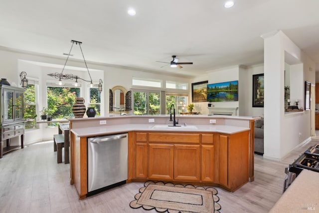 602 Summerset Dr, Rio Vista, CA 94571 - kitchen featuring dishwasher, a sink, light countertops, a ceiling fan, and light wood-style floors