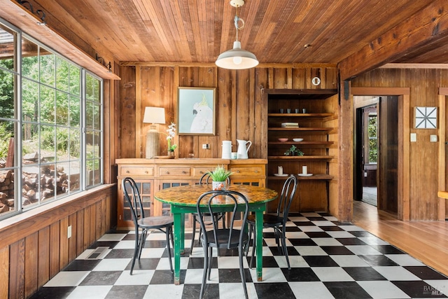 10520 Hwy 116, Forestville, CA 95436 - dining space with dark floors, wood ceiling, and wooden walls