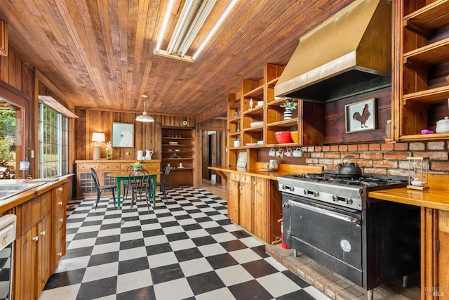 10520 Hwy 116, Forestville, CA 95436 - kitchen featuring stainless steel range, custom exhaust hood, wooden ceiling, wooden walls, and open shelves