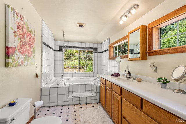 10520 Hwy 116, Forestville, CA 95436 - bathroom featuring plenty of natural light, vanity, a garden tub, and tile patterned floors