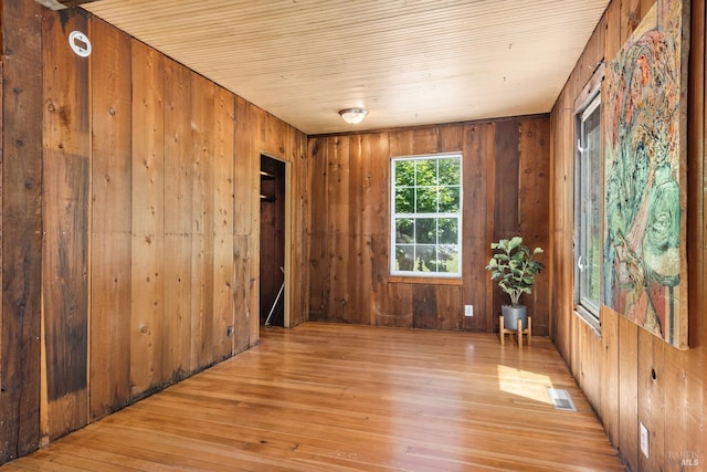 10520 Hwy 116, Forestville, CA 95436 - unfurnished room with light wood-type flooring, wooden walls, and wooden ceiling