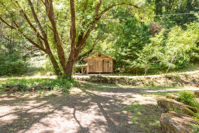 10520 Hwy 116, Forestville, CA 95436 - view of yard with a shed and a forest view