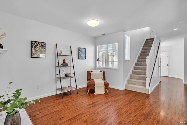 359 Wildrose Cir, Pinole, CA 94564 - sitting room with wood finished floors, stairs, and baseboards