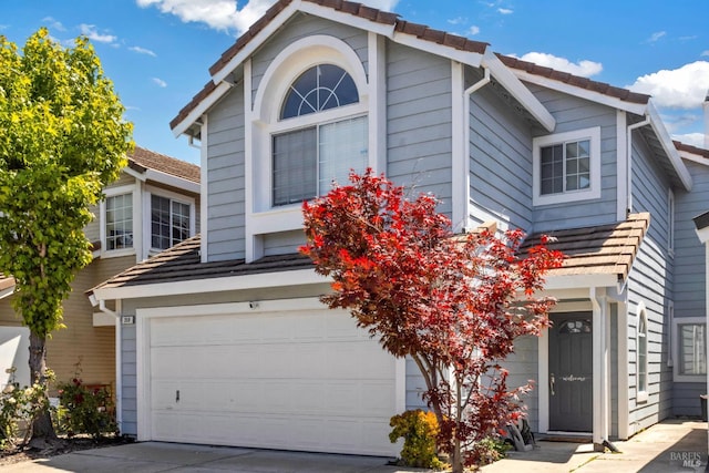 359 Wildrose Cir, Pinole, CA 94564 - view of front facade featuring an attached garage and concrete driveway