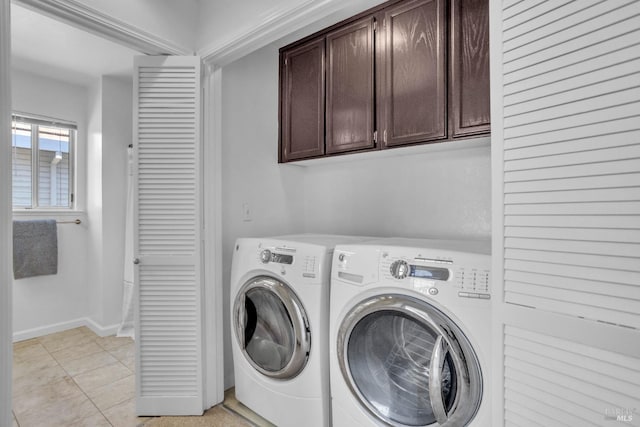 359 Wildrose Cir, Pinole, CA 94564 - laundry area featuring cabinet space, washer and clothes dryer, light tile patterned flooring, and baseboards