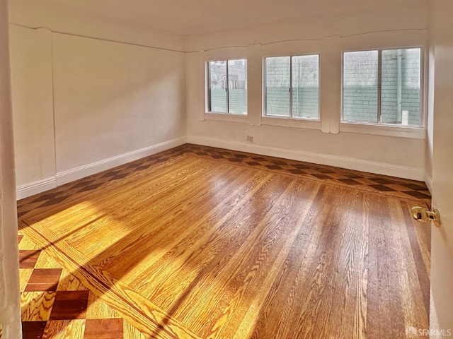 108 Naglee Ave, San Francisco, CA 94112 - unfurnished room with wood finished floors and baseboards