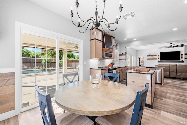 420 Georgetown Pl, Dixon, CA 95620 - dining room with light wood finished floors, recessed lighting, a chandelier, ceiling fan, and baseboards