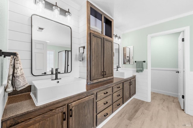 420 Georgetown Pl, Dixon, CA 95620 - bathroom featuring double vanity and wood finished floors