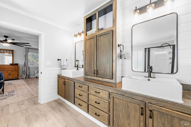 420 Georgetown Pl, Dixon, CA 95620 - full bath with double vanity, ceiling fan, wood finished floors, wainscoting, and crown molding