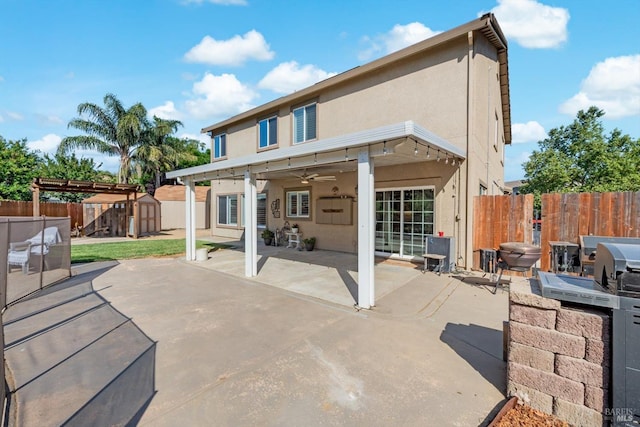 420 Georgetown Pl, Dixon, CA 95620 - back of house with a patio, a fenced backyard, stucco siding, and ceiling fan