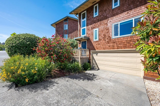 490 S Eliseo Dr, Greenbrae, CA 94904 - view of front of home with an attached garage and concrete driveway