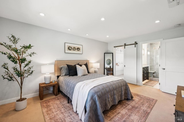 490 S Eliseo Dr, Greenbrae, CA 94904 - bedroom with a barn door, light colored carpet, recessed lighting, baseboards, and ensuite bath