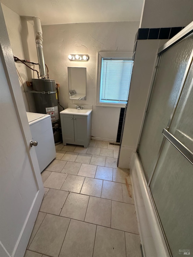 942 Benicia Rd, Vallejo, CA 94591 - full bathroom featuring vanity, strapped water heater, tile patterned flooring, enclosed tub / shower combo, and a textured wall