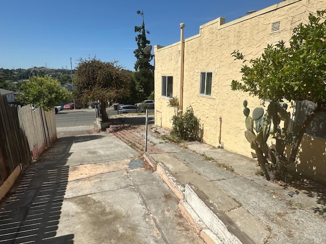 942 Benicia Rd, Vallejo, CA 94591 - view of side of home featuring stucco siding