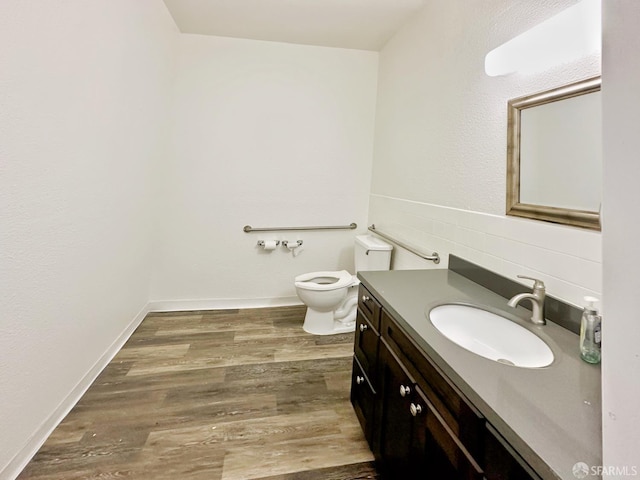 1927 Taraval St, San Francisco, CA 94116 - bathroom featuring vanity, backsplash, toilet, and wood finished floors