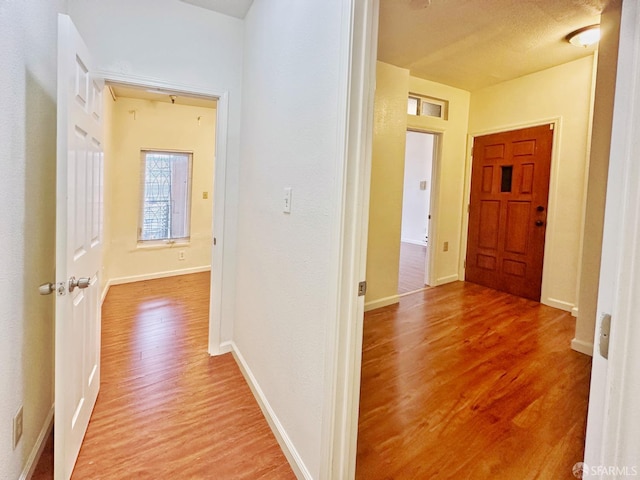 1927 Taraval St, San Francisco, CA 94116 - hallway with light wood-type flooring, attic access, and baseboards