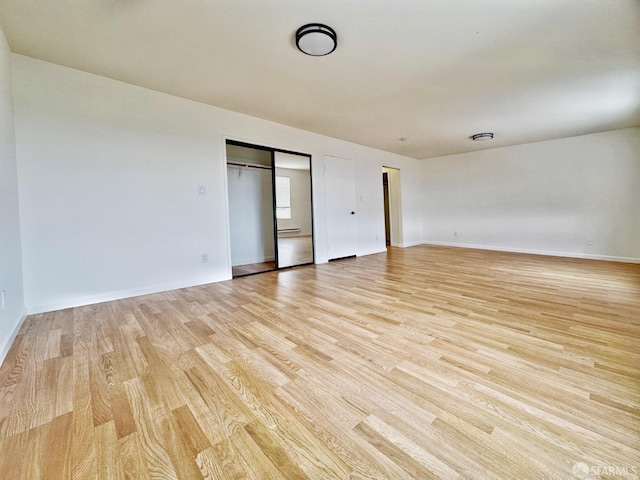 1927 Taraval St, San Francisco, CA 94116 - empty room featuring light wood-style floors and baseboards