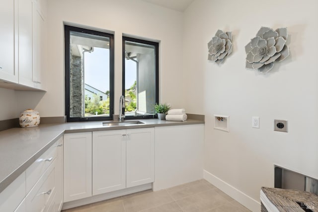 3704 Llyn Glaslyn Pl, Santa Rosa, CA 95403 - washroom with hookup for an electric dryer, hookup for a washing machine, cabinet space, light tile patterned flooring, and baseboards