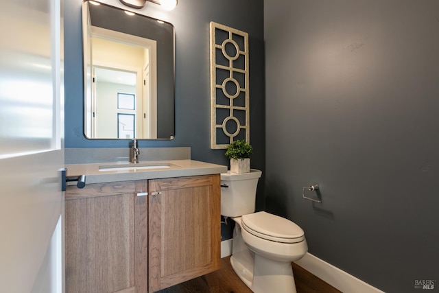 3704 Llyn Glaslyn Pl, Santa Rosa, CA 95403 - half bath featuring toilet, vanity, wood finished floors, and baseboards