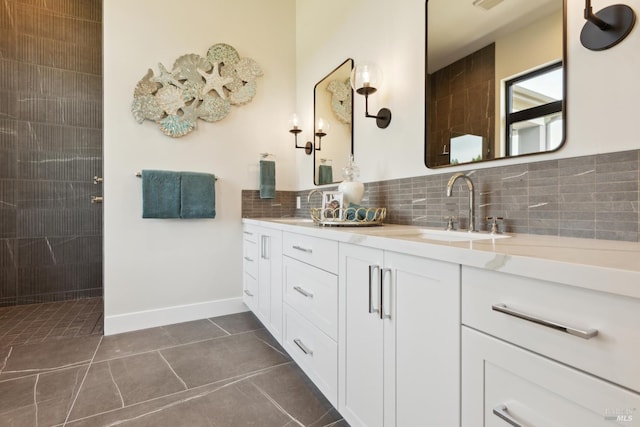 3704 Llyn Glaslyn Pl, Santa Rosa, CA 95403 - bathroom with double vanity, backsplash, tile patterned flooring, a tile shower, and baseboards