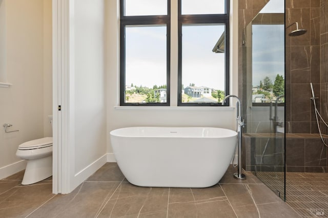 3704 Llyn Glaslyn Pl, Santa Rosa, CA 95403 - full bath with a freestanding tub, tiled shower, toilet, baseboards, and tile patterned flooring