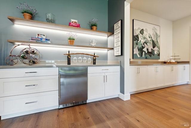 3704 Llyn Glaslyn Pl, Santa Rosa, CA 95403 - indoor dry bar with light wood-style floors and stainless steel dishwasher