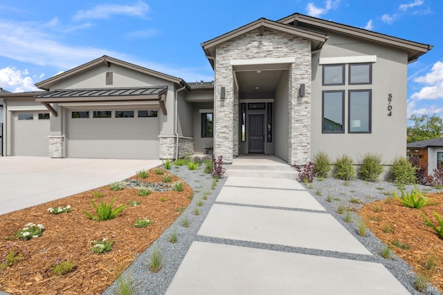 3704 Llyn Glaslyn Pl, Santa Rosa, CA 95403 - view of front facade featuring stone siding, stucco siding, an attached garage, and a standing seam roof