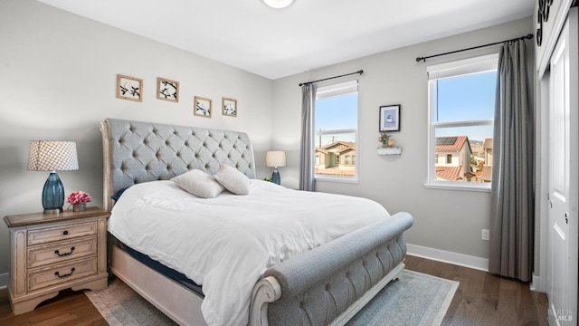 1212 Del Rancho Way, Petaluma, CA 94954 - bedroom with baseboards and dark wood-style flooring