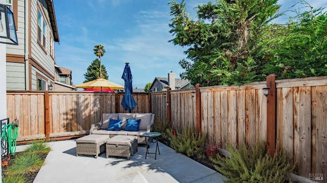 1212 Del Rancho Way, Petaluma, CA 94954 - fenced backyard with a patio area and an outdoor hangout area