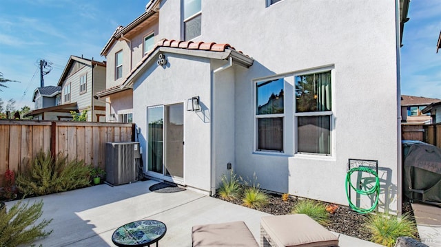 1212 Del Rancho Way, Petaluma, CA 94954 - back of property featuring a patio area, central air condition unit, and stucco siding