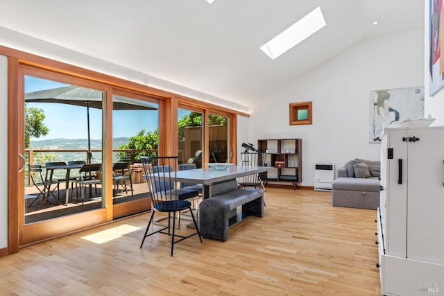10 Waldruhe Hts, Glen Ellen, CA 95442 - dining area with light wood-style floors, a skylight, high vaulted ceiling, and heating unit