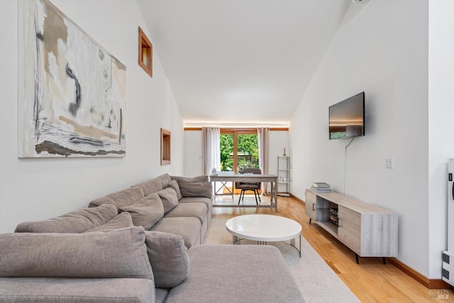 10 Waldruhe Hts, Glen Ellen, CA 95442 - living area featuring light wood finished floors and vaulted ceiling