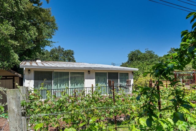 10 Waldruhe Hts, Glen Ellen, CA 95442 - view of front of home with a chimney and a sunroom
