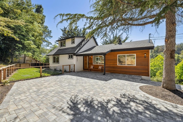 532 Pine Crest Rd, Mill Valley, CA 94941 - back of property with stucco siding, a patio, and roof with shingles