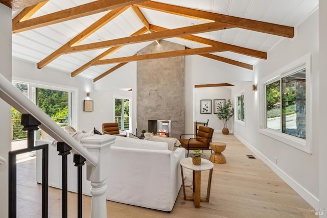 532 Pine Crest Rd, Mill Valley, CA 94941 - living area featuring baseboards, beamed ceiling, a multi sided fireplace, light wood-style flooring, and high vaulted ceiling